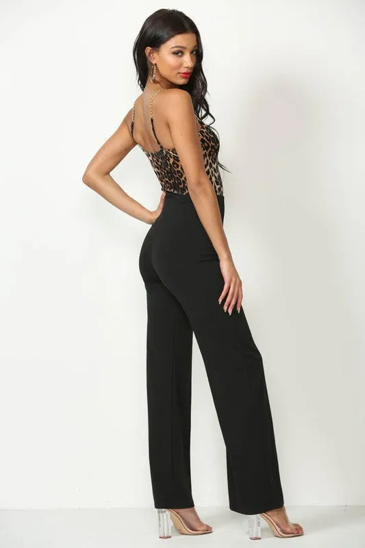 Black Solid, Full Length Pants In A Flare Style With A High Waist, And Wide Legs