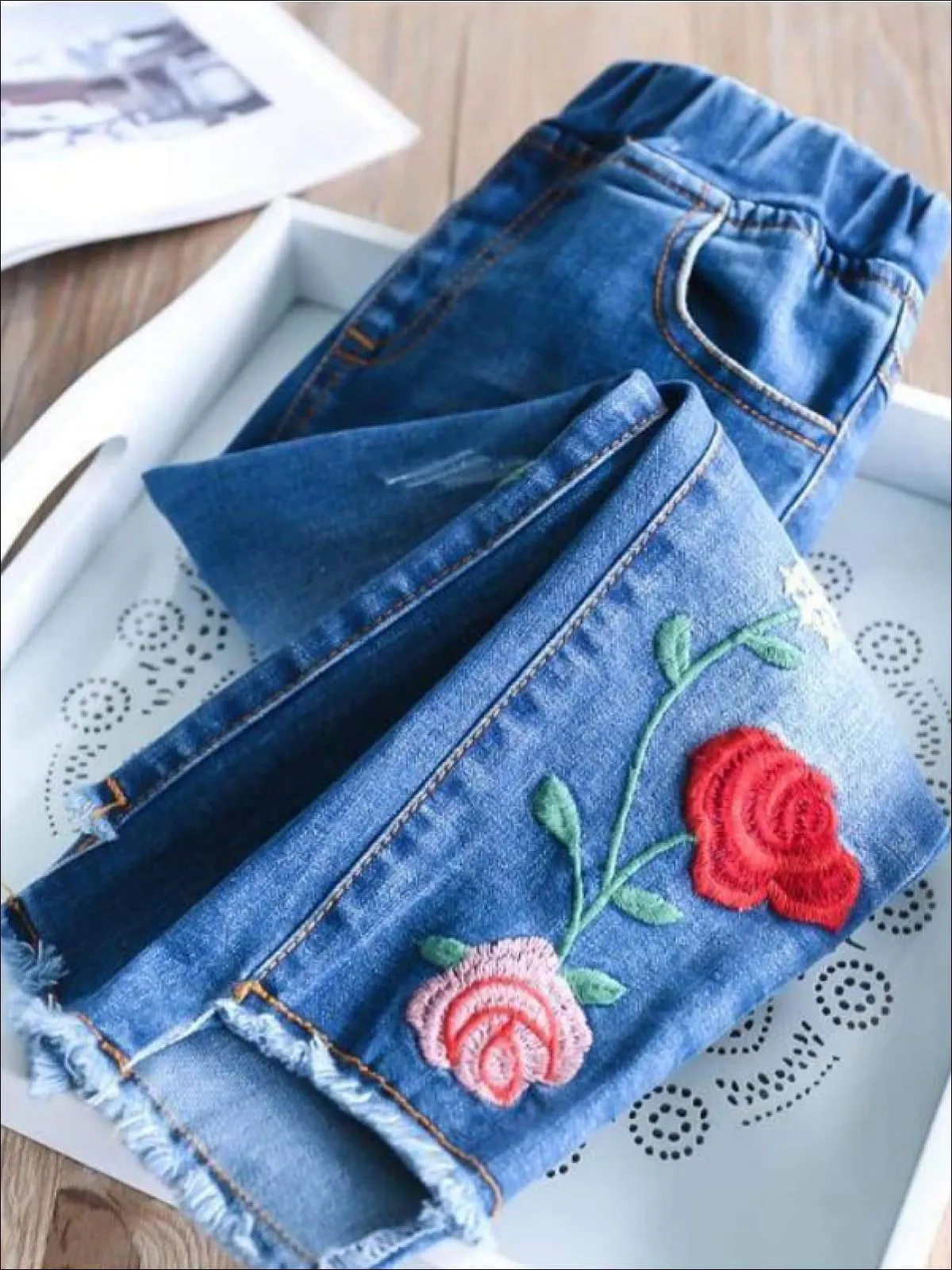 Rose Embroidered Raw Hem Jeans